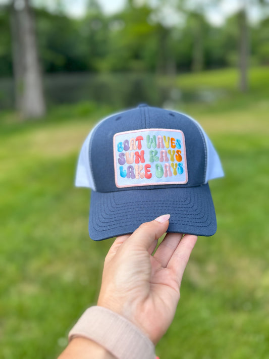 BOAT WAVES SUN RAYS LAKE DAYS ADJUSTABLE TRUCKER HAT